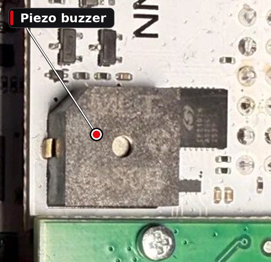 Macro shot of the piezo buzzer on the HAT